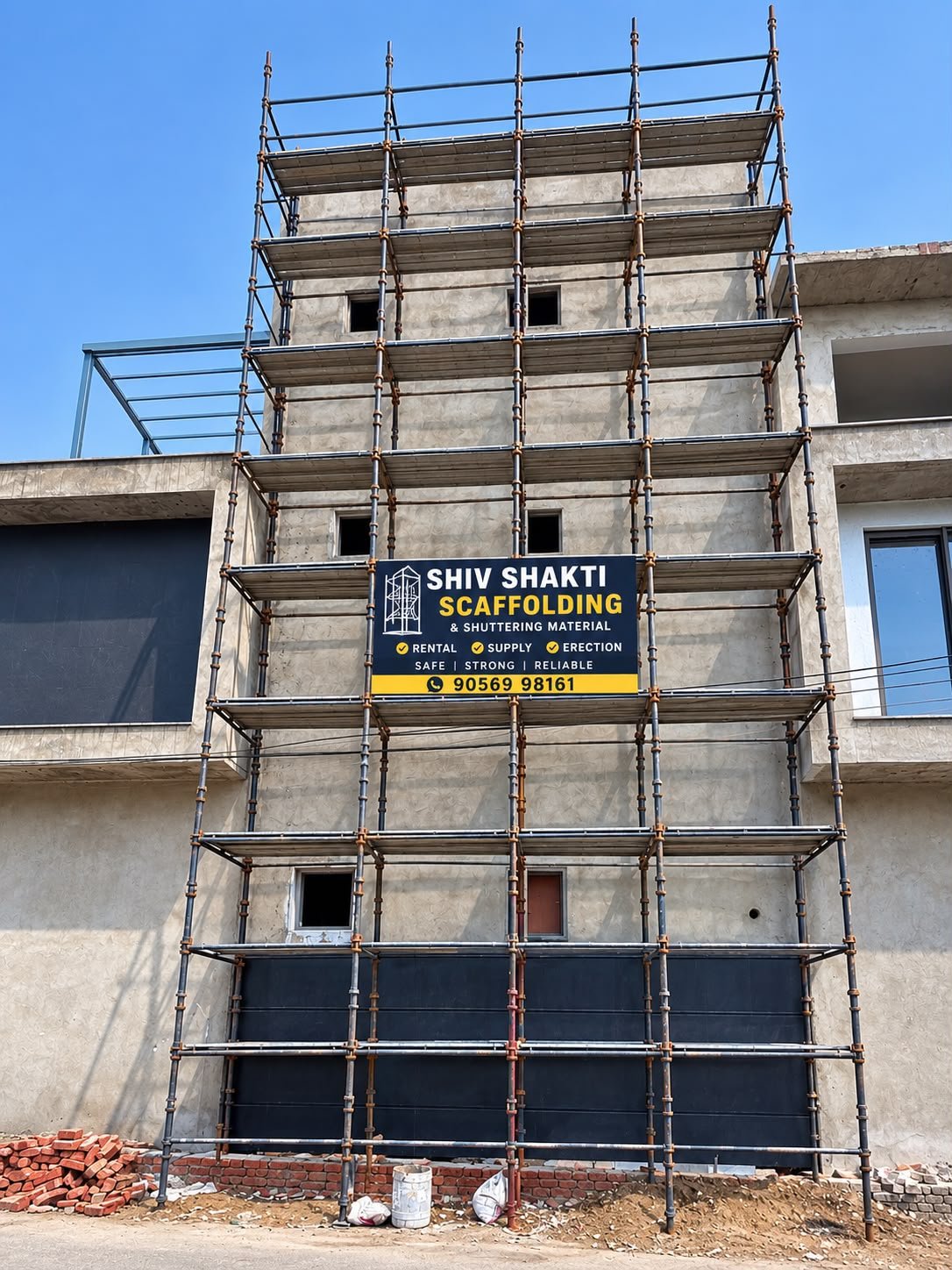 Shiv Shakti scaffolding installation with company sign